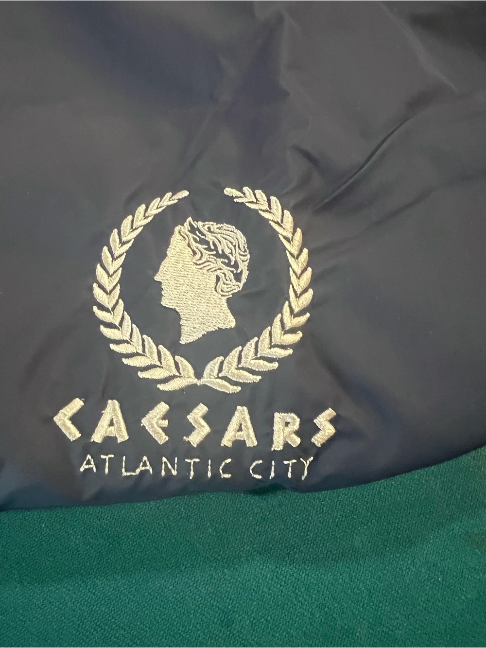 Caesars Palace AC Black Raincoat Hidden Hood with Gold Embroidery Never worn